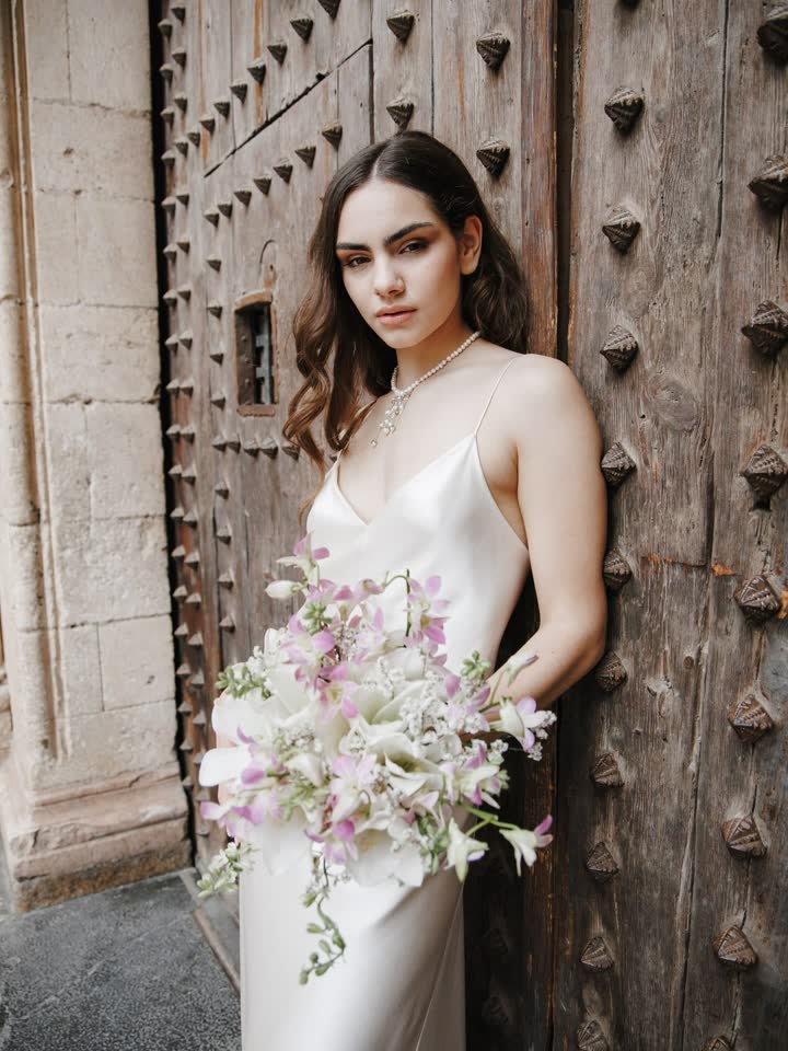 Bride in a silk dress by Atelier Anna